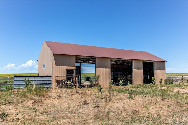 view of outdoor structure featuring a rural view