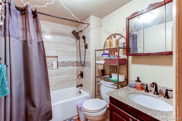 full bathroom with shower / bath combo, toilet, and vanity