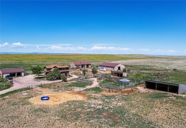 view of yard with a rural view