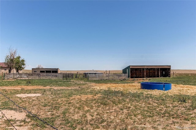 view of yard featuring a rural view