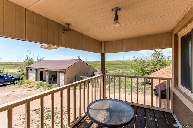 balcony featuring a rural view