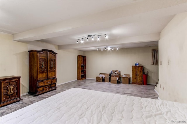 bedroom with light wood-type flooring