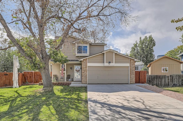6311 Xavier St, Arvada, CO 80003 - traditional home with brick siding, driveway, a porch, and a garage