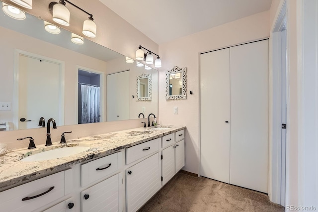 6311 Xavier St, Arvada, CO 80003 - bathroom featuring double vanity