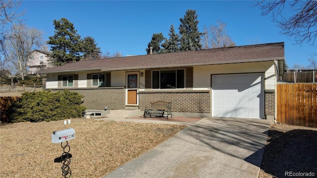 single story home featuring a garage