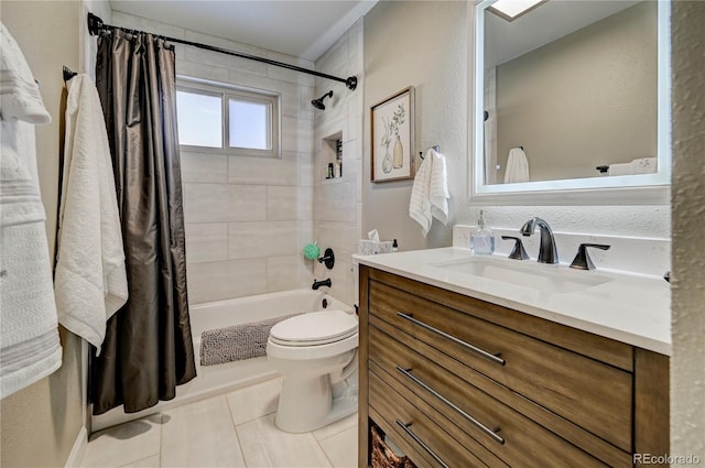 full bathroom with tile patterned floors, shower / bath combination with curtain, toilet, and vanity