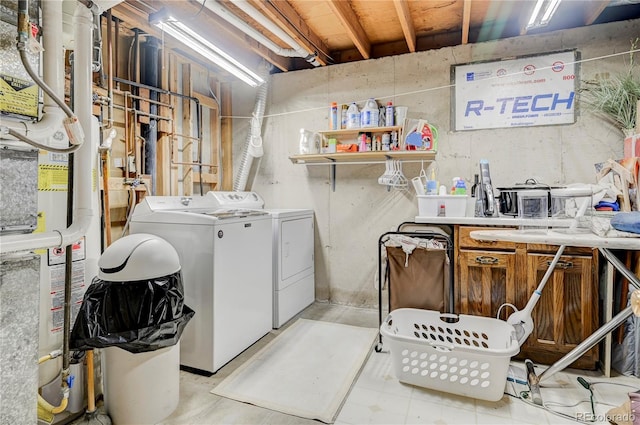 washroom with washer and dryer