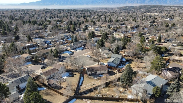 birds eye view of property featuring a mountain view