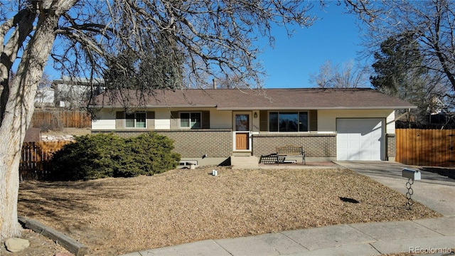 ranch-style home featuring a garage