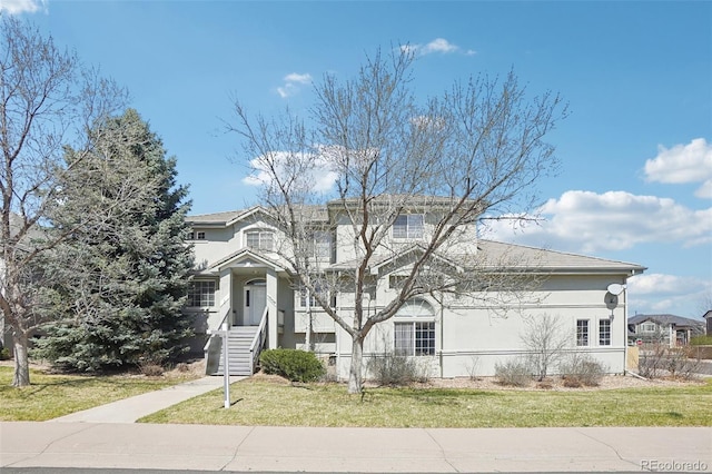 17309 Witten Ct, Parker, CO 80134 - traditional home with a front yard and stucco siding