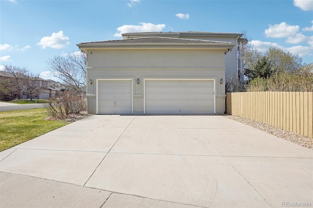 17309 Witten Ct, Parker, CO 80134 - garage with fence and concrete driveway