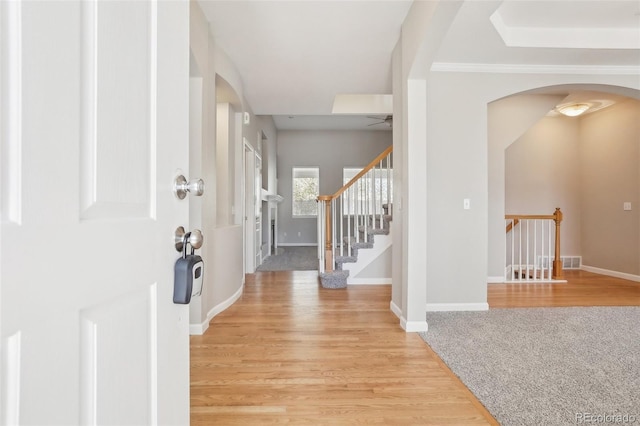 17309 Witten Ct, Parker, CO 80134 - foyer featuring visible vents, baseboards, and arched walkways