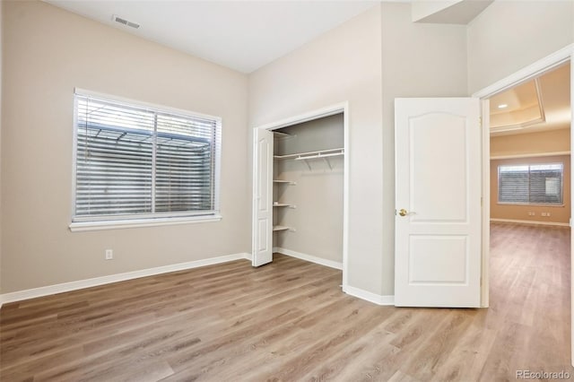17309 Witten Ct, Parker, CO 80134 - unfurnished bedroom with light wood-type flooring, a closet, baseboards, and visible vents