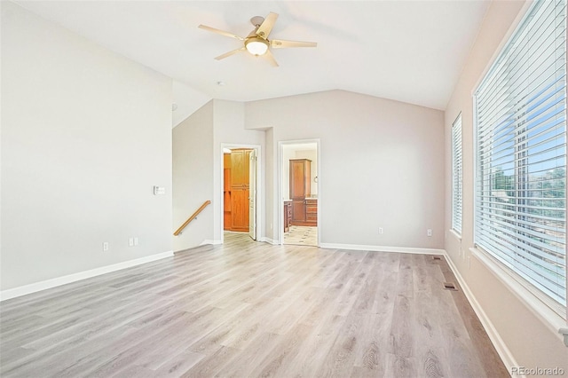 17309 Witten Ct, Parker, CO 80134 - unfurnished room with light wood-style flooring, ceiling fan, vaulted ceiling, and baseboards