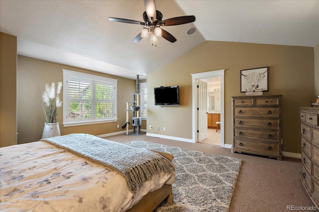 2861 Madison Ln, Broomfield, CO 80023 - bedroom with lofted ceiling, light colored carpet, baseboards, ensuite bath, and a ceiling fan