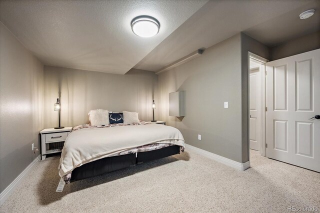 2861 Madison Ln, Broomfield, CO 80023 - carpeted bedroom featuring baseboards and a textured ceiling