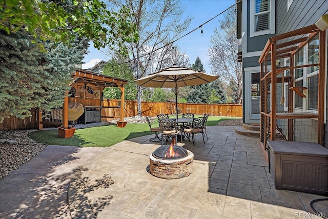 2861 Madison Ln, Broomfield, CO 80023 - view of patio / terrace with an outdoor fire pit, outdoor dining space, and entry steps