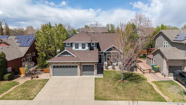 2861 Madison Ln, Broomfield, CO 80023 - view of front facade with driveway, a residential view, an attached garage, and a front lawn