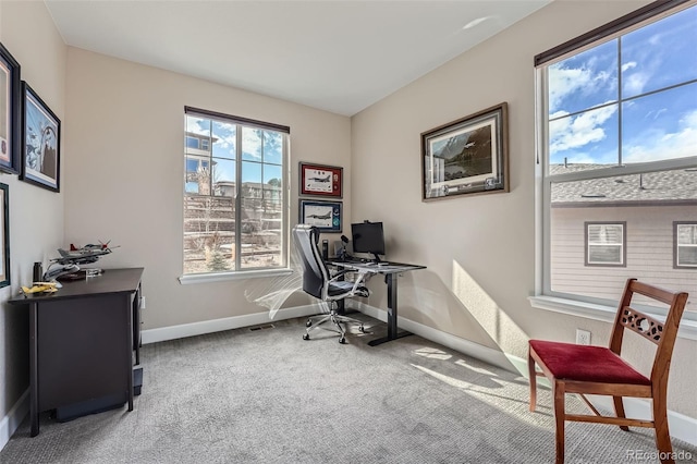 office area featuring carpet flooring and baseboards