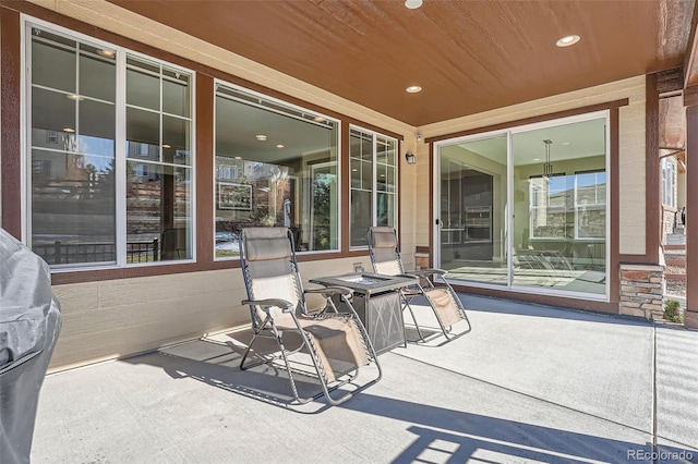 view of patio / terrace with a fire pit