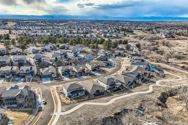 birds eye view of property with a residential view and a mountain view