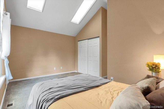 18131 E Arizona Ave Unit B, Aurora, CO 80017 - carpeted bedroom featuring a closet, a skylight, and high vaulted ceiling