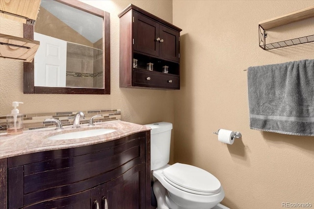 18131 E Arizona Ave Unit B, Aurora, CO 80017 - full bathroom with vanity, a textured wall, and a shower