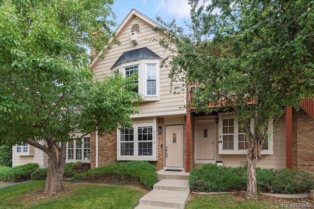 18131 E Arizona Ave Unit B, Aurora, CO 80017 - view of front of home featuring brick siding