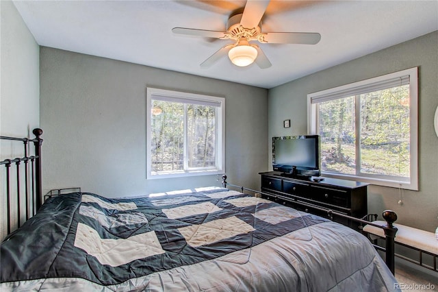 362 Kite Ct, Jefferson, CO 80456 - bedroom with a ceiling fan and a textured wall