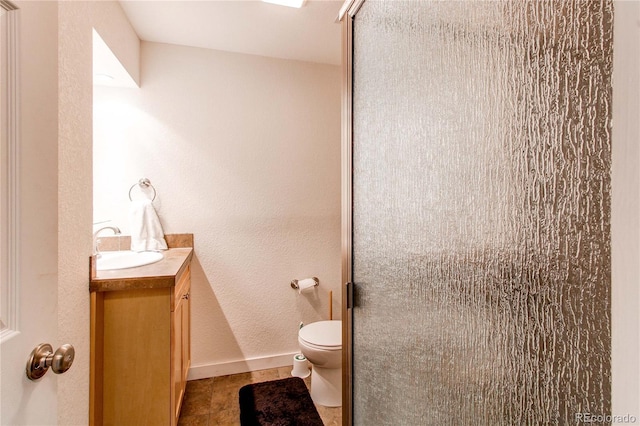362 Kite Ct, Jefferson, CO 80456 - full bath with vanity, a shower stall, and a textured wall