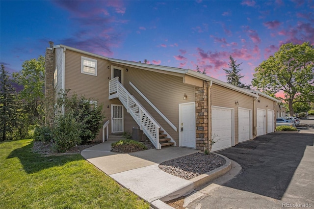 360 S Estes St Unit C, Lakewood, CO 80228 - view of building exterior featuring cooling unit and stairs