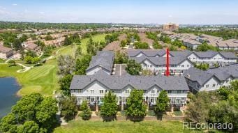 2945 W Riverwalk Cir Unit B, Littleton, CO 80123 - aerial perspective of suburban area with a nearby body of water and a local golf course