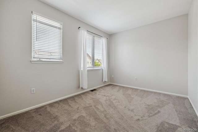2945 W Riverwalk Cir Unit B, Littleton, CO 80123 - carpeted spare room with baseboards