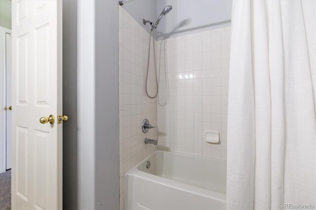 2945 W Riverwalk Cir Unit B, Littleton, CO 80123 - bathroom featuring shower / bath combo