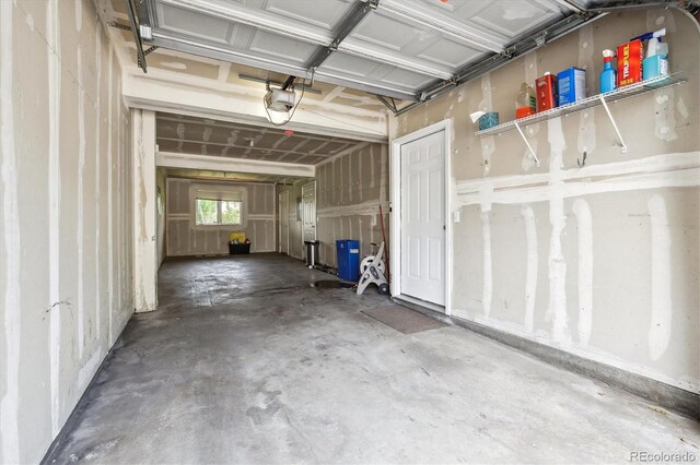 2945 W Riverwalk Cir Unit B, Littleton, CO 80123 - garage with a garage door opener