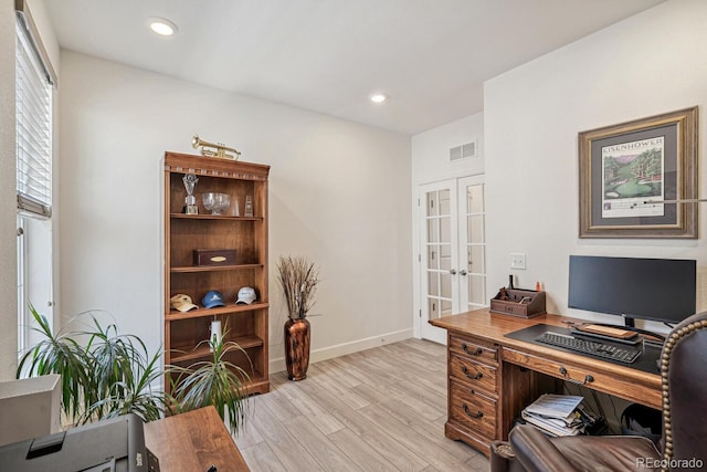 office with recessed lighting, french doors, visible vents, and light wood finished floors