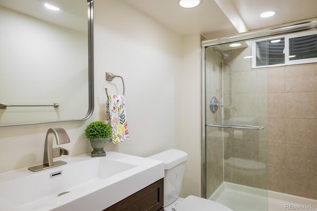 740 Lotus Way, Broomfield, CO 80020 - full bathroom featuring recessed lighting, a stall shower, toilet, and vanity