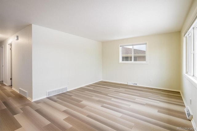740 Lotus Way, Broomfield, CO 80020 - spare room featuring light wood-type flooring and baseboards