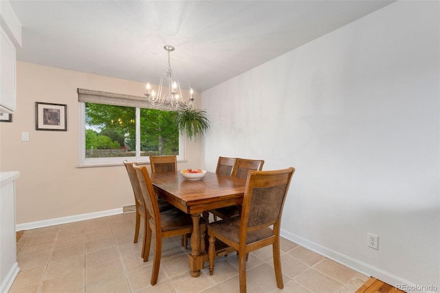 6798 Depew St, Arvada, CO 80003 - dining room with a chandelier and baseboards
