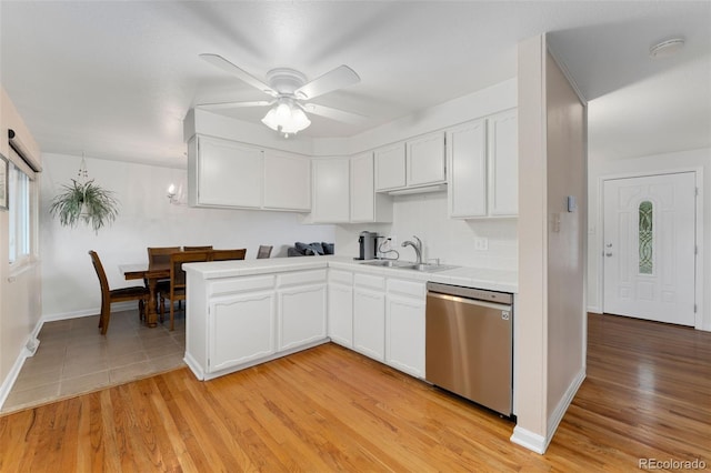 6798 Depew St, Arvada, CO 80003 - kitchen featuring dishwasher, white cabinetry, a ceiling fan, and light wood-style floors