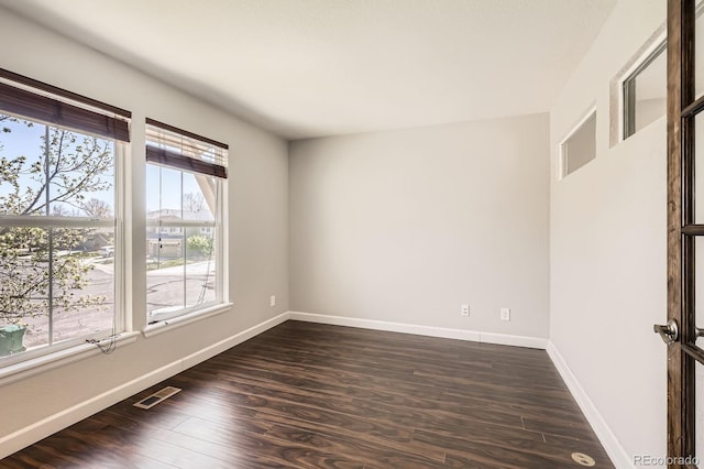 7838 W Layton Way, Littleton, CO 80123 - empty room with baseboards and dark wood-style floors