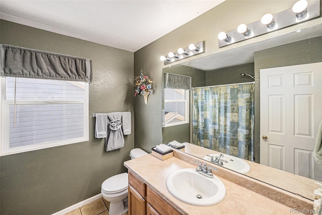 bathroom featuring tile patterned flooring, vanity, a textured wall, toilet, and a shower with curtain