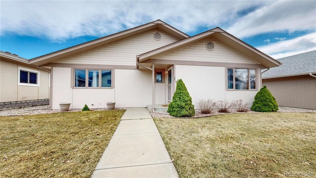 ranch-style house with a front yard