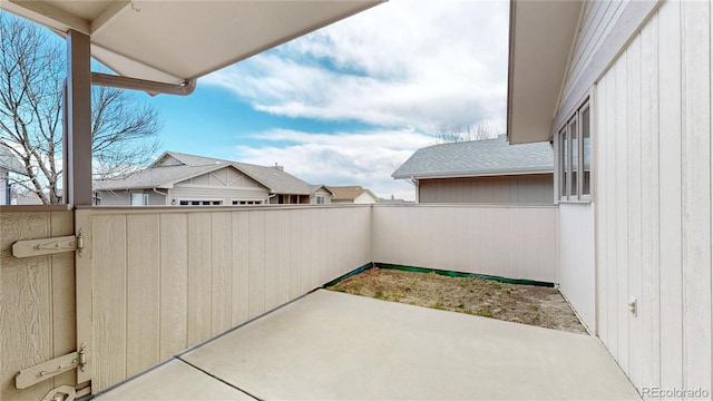 view of patio with a balcony