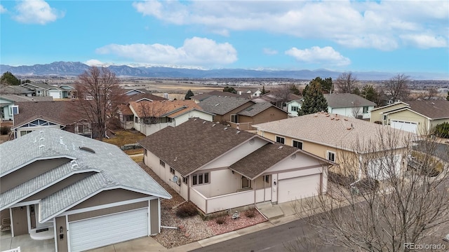 aerial view with a residential view and a mountain view