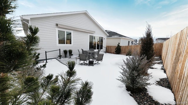 view of snow covered property