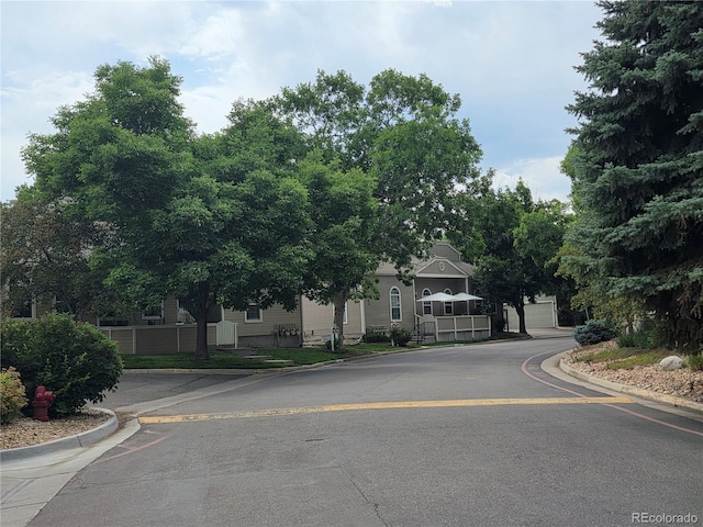 5741 W Asbury Pl, Lakewood, CO 80227 - view of asphalt street featuring curbs