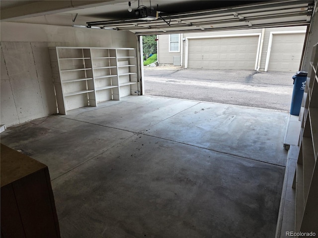 5741 W Asbury Pl, Lakewood, CO 80227 - garage featuring a garage door opener