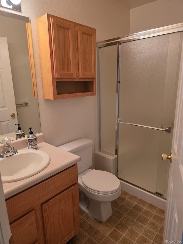 5741 W Asbury Pl, Lakewood, CO 80227 - bathroom with vanity and a shower stall