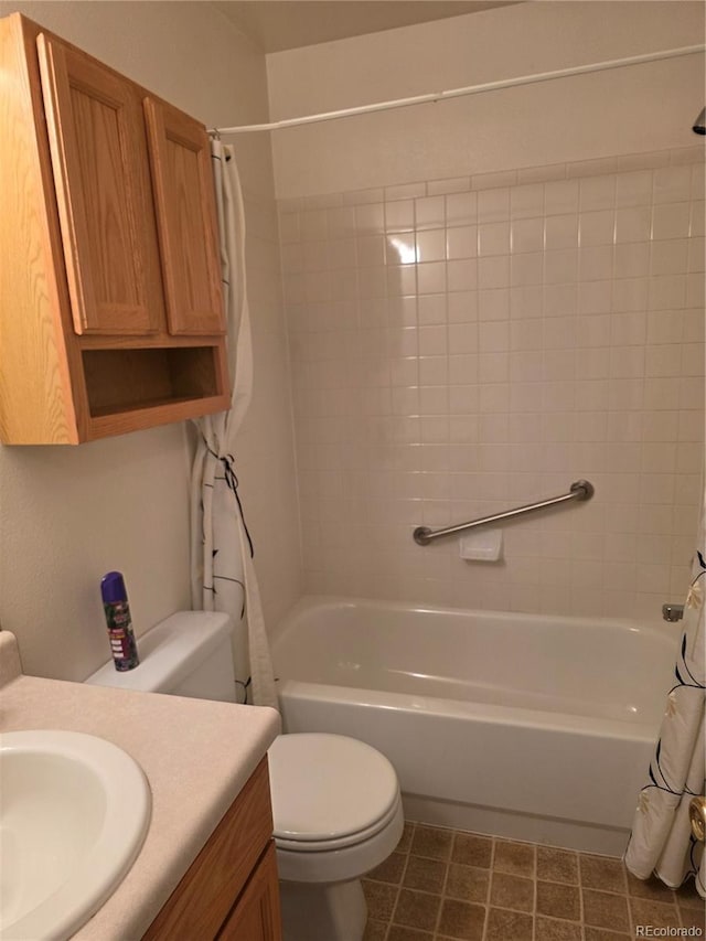 5741 W Asbury Pl, Lakewood, CO 80227 - bathroom with vanity and shower / bath combo with shower curtain